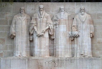 The Reformation Wall in Geneva. From left: William Farel, John Calvin, Beza, and John Knox